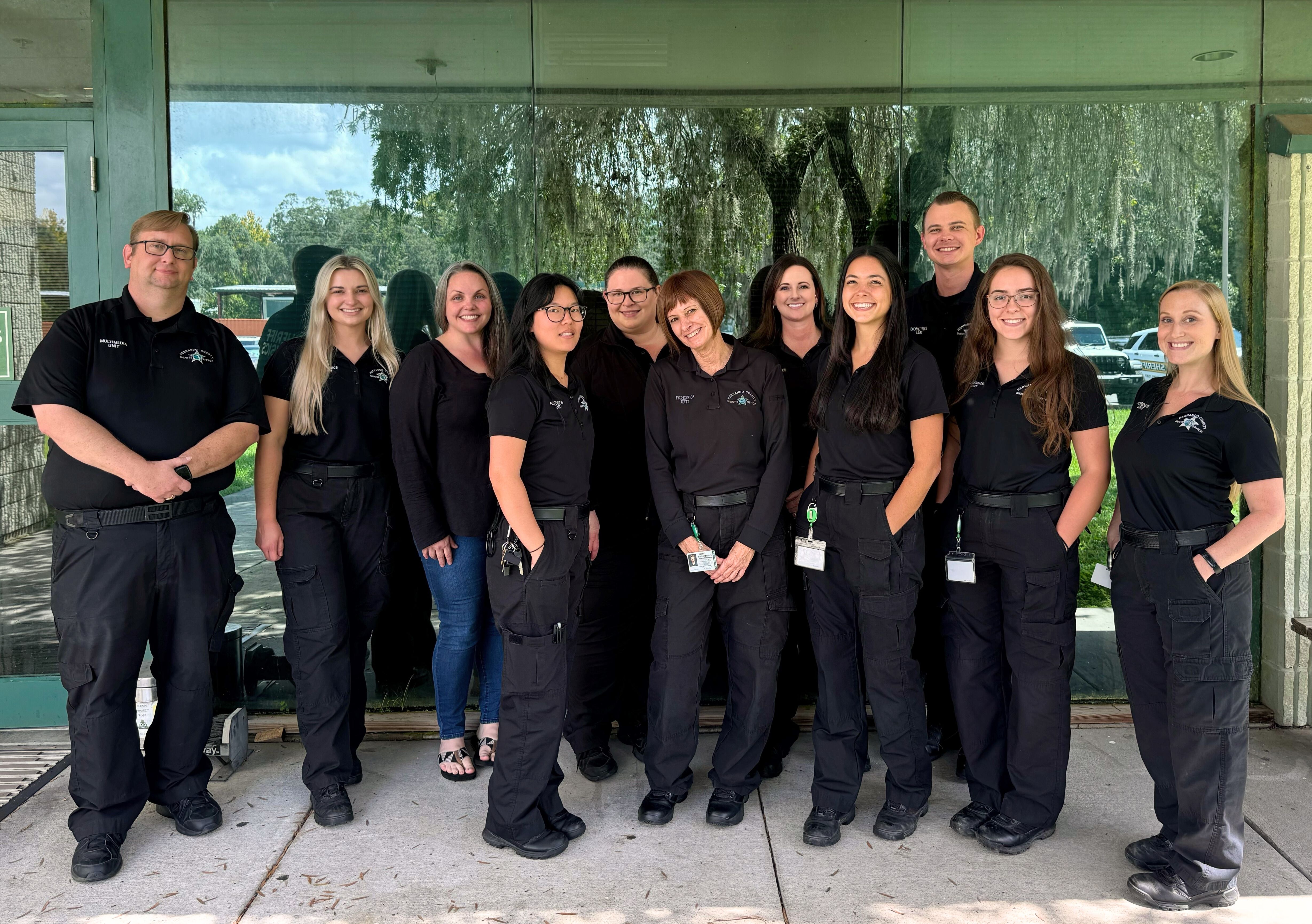 Group photo of forensics lab staff.